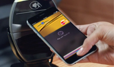 Photo of person using Apple Pay